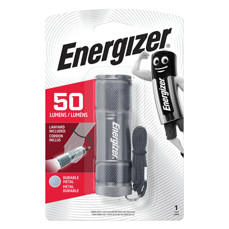 The packaging for the Energizer Metal LED Torch 50 Lumen highlights its sturdy metal build and compact design, offering a brightness of 50 lumens. It includes a lanyard and features a cheerful battery character.