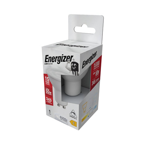 The packaging of the Energizer 3.6W GU10 Dimmable LED Bulb - Cool White, 4000K displays key features such as a 15,000-hour lifespan, equivalent brightness to a 50W bulb, and an output of 345 lumens. The predominantly white box with black and red text includes a cutout that reveals part of this energy-efficient lighting solution.