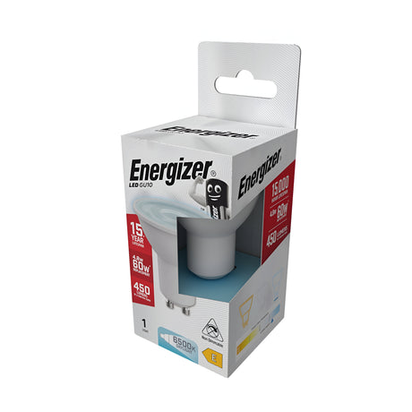 The packaging of an Energizer 4.8W GU10 Non-Dimmable LED Bulb highlights its energy-efficient features, boasting a 15,000-hour lifespan and a power equivalent to 65 watts. It offers 450 lumens of brightness with a crisp daylight color temperature of 6500K, and the design includes a smiling character holding the bulb, ideal for GU10 sockets.