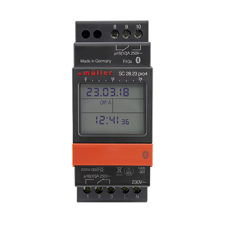 A digital electronic timer labeled Astro Bluetooth 2 Module 2 Channel 7 Day Time Switch, with a display showing the date 23.03.18 and time 12:41, programmable via an App for convenience. It includes multiple terminal connectors and features Astro programming for precise control.