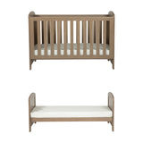 Seeker Convertible Cot Bed & 3 Position Base in Drift, shown as a slatted cot with mattress and as a converted toddler bed, oak-effect wood finish, on a plain white background.