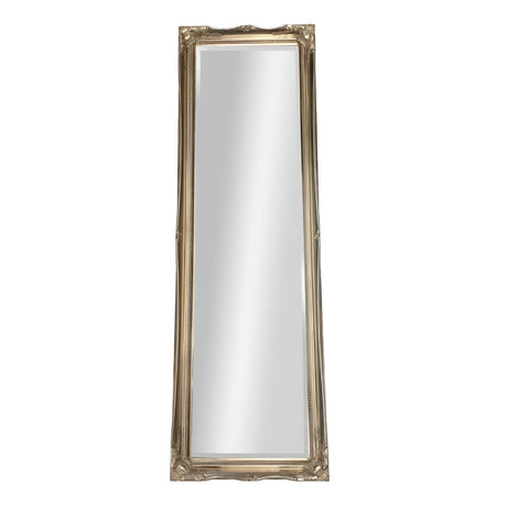 Introducing the Miralux Free Standing Mirror - Silver, a tall mirror designed with an ornate frame that showcases intricate detailing at the corners and along the edges. This stunning piece of home decor features a reflective surface and is finished in silver, bringing sophistication to any space.