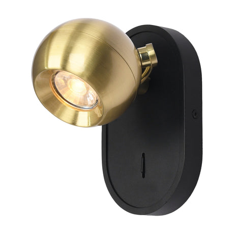 Lens wall light in black and brass finish