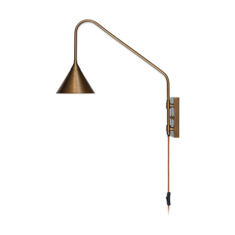 Thottam Swing Arm Wall Light in antique brass, with a wall-mounted plate, angular swing arm, conical shade, and rust-coloured plug lead with inline switch, shown on a white background.