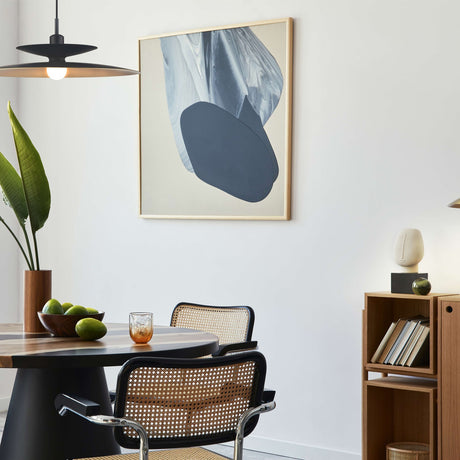 Cole table lamp in brass finish, shown in a room setting