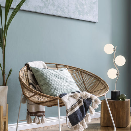 Cosmic 3 light table lamp, shown in a room setting