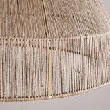 Close-up of the Tivi Natural Jute Lampshade, a dome-shaped shade with fine jute cord wound vertically over a visible brass frame, bound with a horizontal band near the rim.