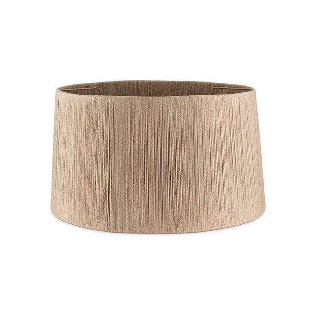Tiwa Small Woven Jute Lampshade in natural straw-toned jute cord with a tapered drum shape, fine vertical ribbed texture, and visible brass fitting ring, on a plain white background.