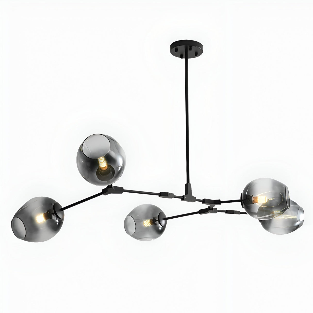 The Tree 5 Light Suspension - Black features five arms with smoky glass globe shades on a matte black rod, showcasing exposed bulbs for a modern, industrial touch and contemporary elegance.