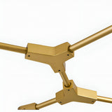 Close-up view of the Tree 6 Light Suspension - Gold, featuring angular joints and tubular arms, highlighting its luxurious modern design lighting against a plain white background.