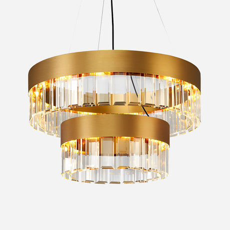 The Donato 12 Light Crystal Suspension Light - Gold features a luxurious double-ring design with a gold frame, adorned with crystal embellishments. This exquisite chandelier hangs gracefully from the ceiling, its golden glow enhancing the elegance and modernity of any space.