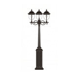 Volute 3-light outdoor lamp post in black with copper-top lantern roofs, fluted column base and scrolled brackets, shown on a plain white background.