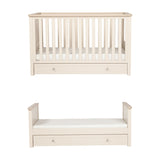 Wanderer Convertible Cot Bed with Drawer in Cashmere, shown as a slatted cot with mattress and as a toddler bed with side rails, both with an under-bed drawer, on a white background.