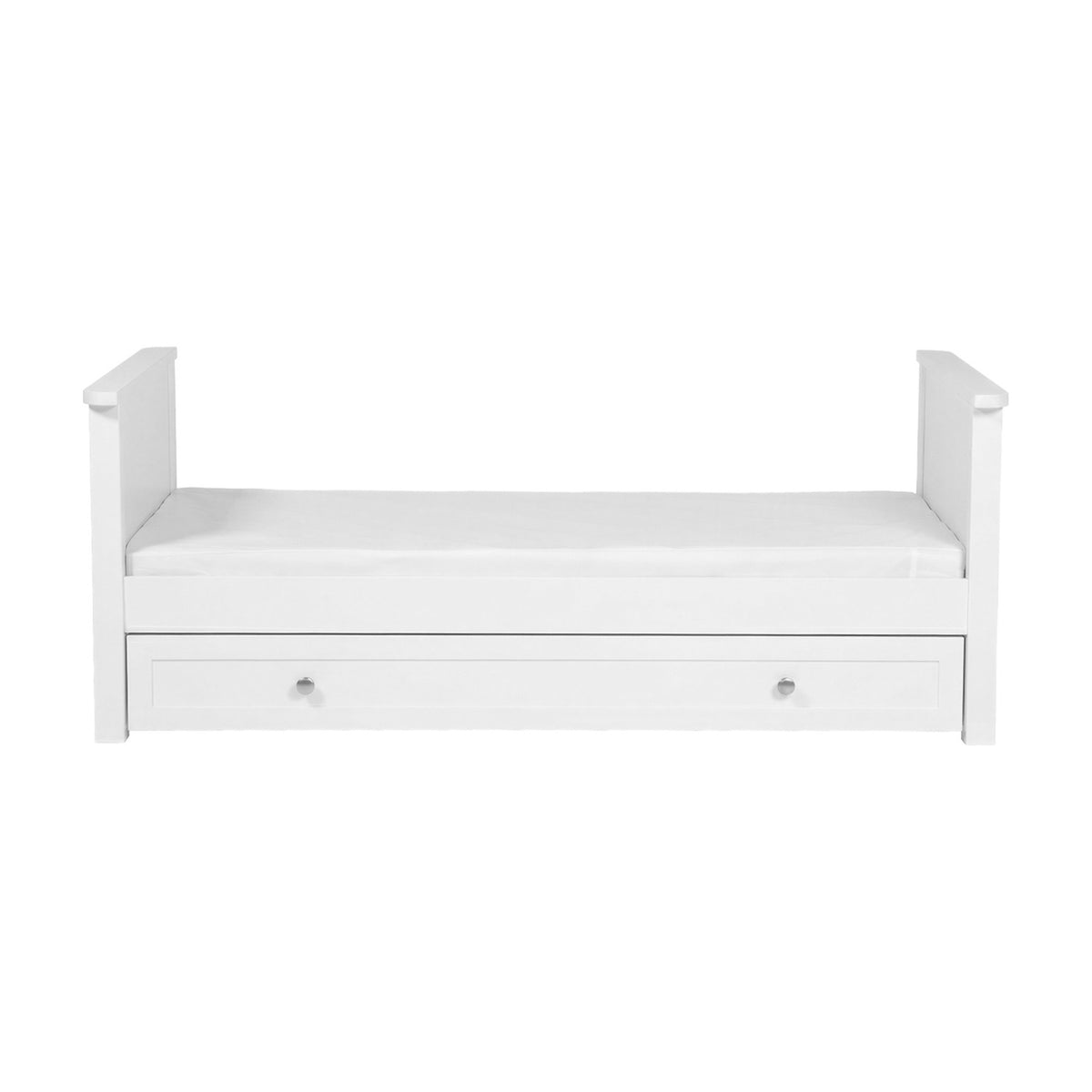 Wanderer Convertible Cot Bed with Drawer in white MDF, shown as a day bed with raised end panels, white mattress, and an under-bed storage drawer with two round knobs, on a plain background.