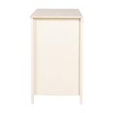 Side view of the Wanderer Changing Table in cashmere, showing a tall wooden leg, plain cream side panel, and oak-effect tabletop against a white background.