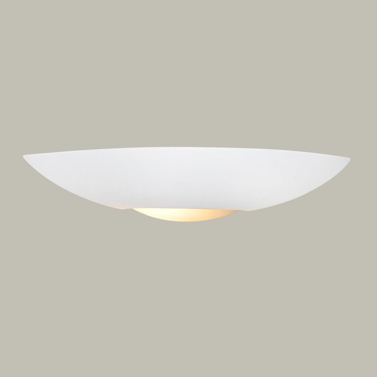 Ceramic wall light, shown on a dark background