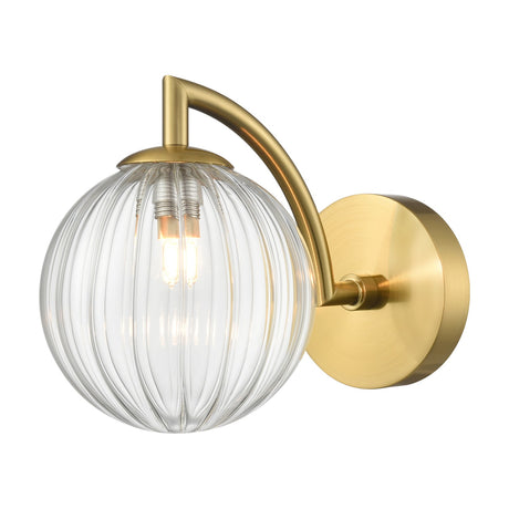 Globe wall light in brass finish