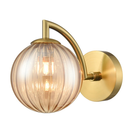 Globe wall light in brass finish