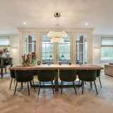 Victoria 2 light wall light in gold finish, shown in a room setting