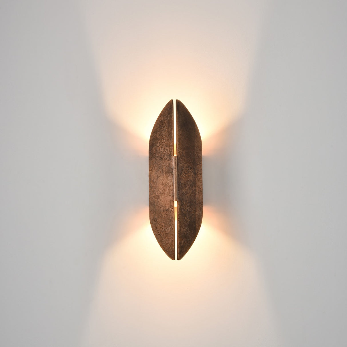 Warrior 2 light exterior wall light in copper finish, shown on a dark background