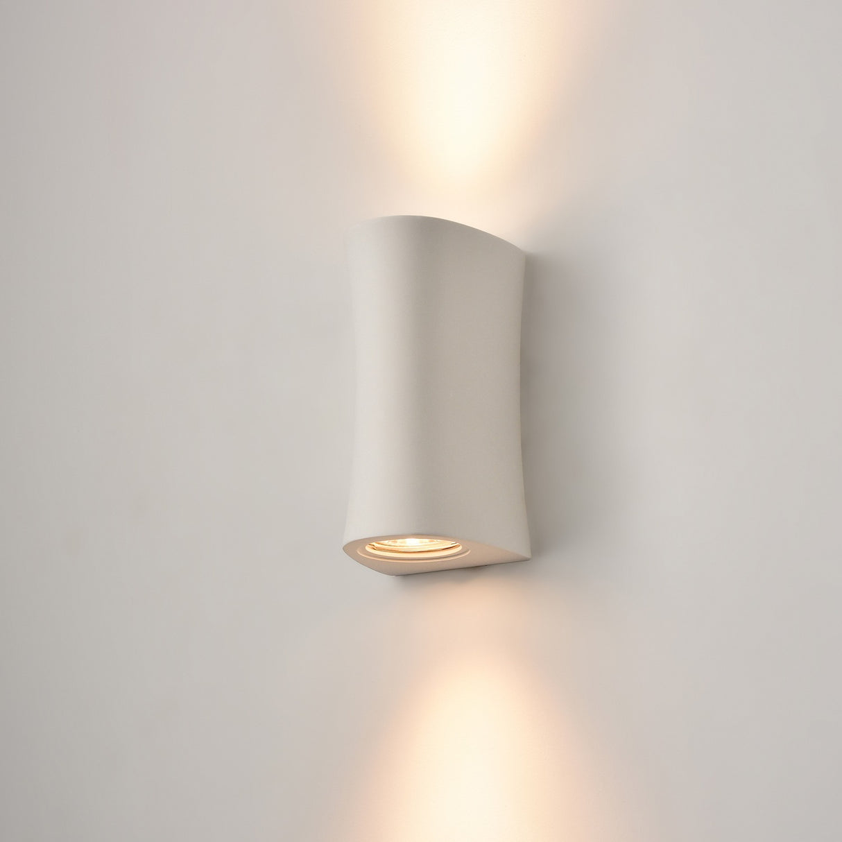 Fresco 2 light wall light, shown on a dark background