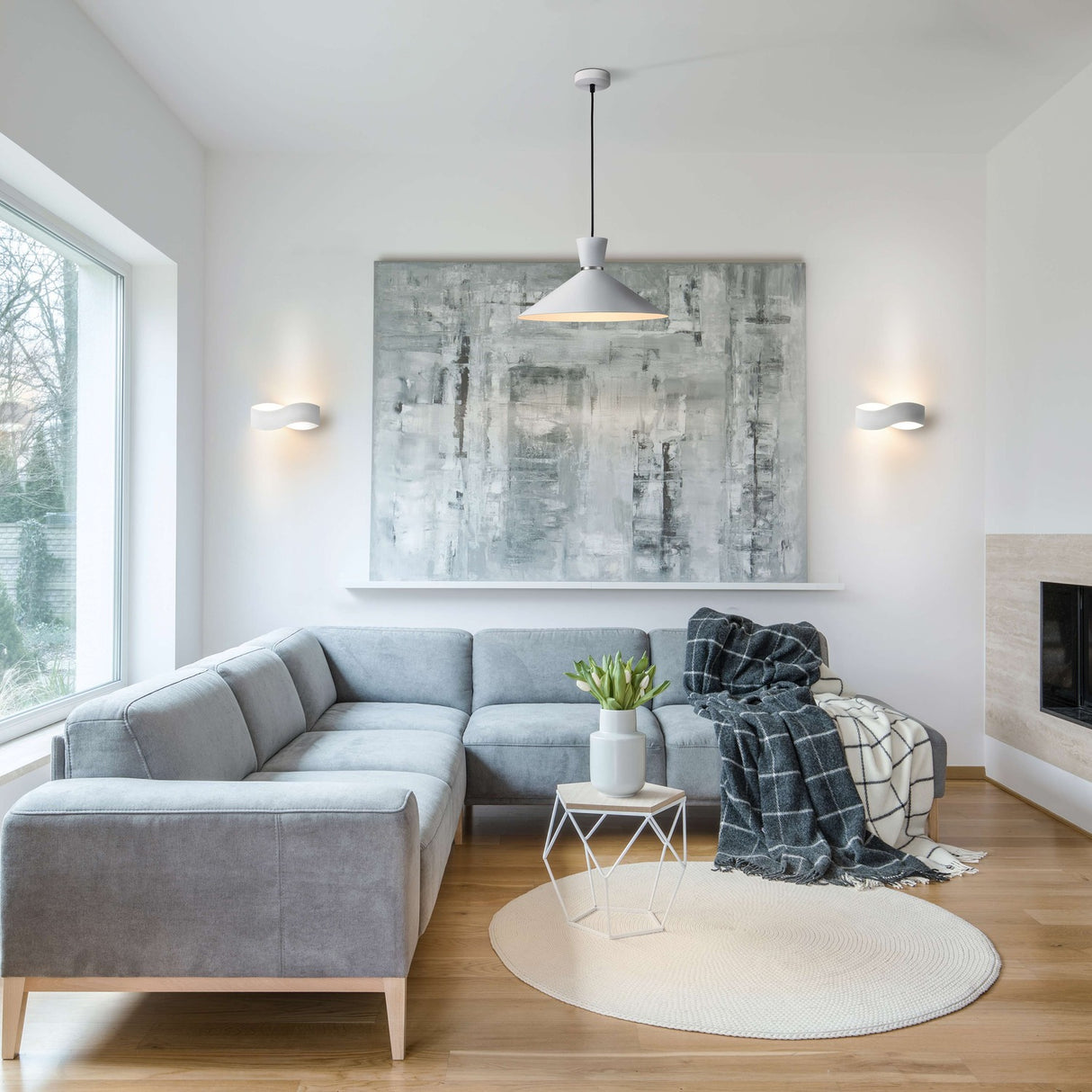 Infinity wall light, shown in a room setting