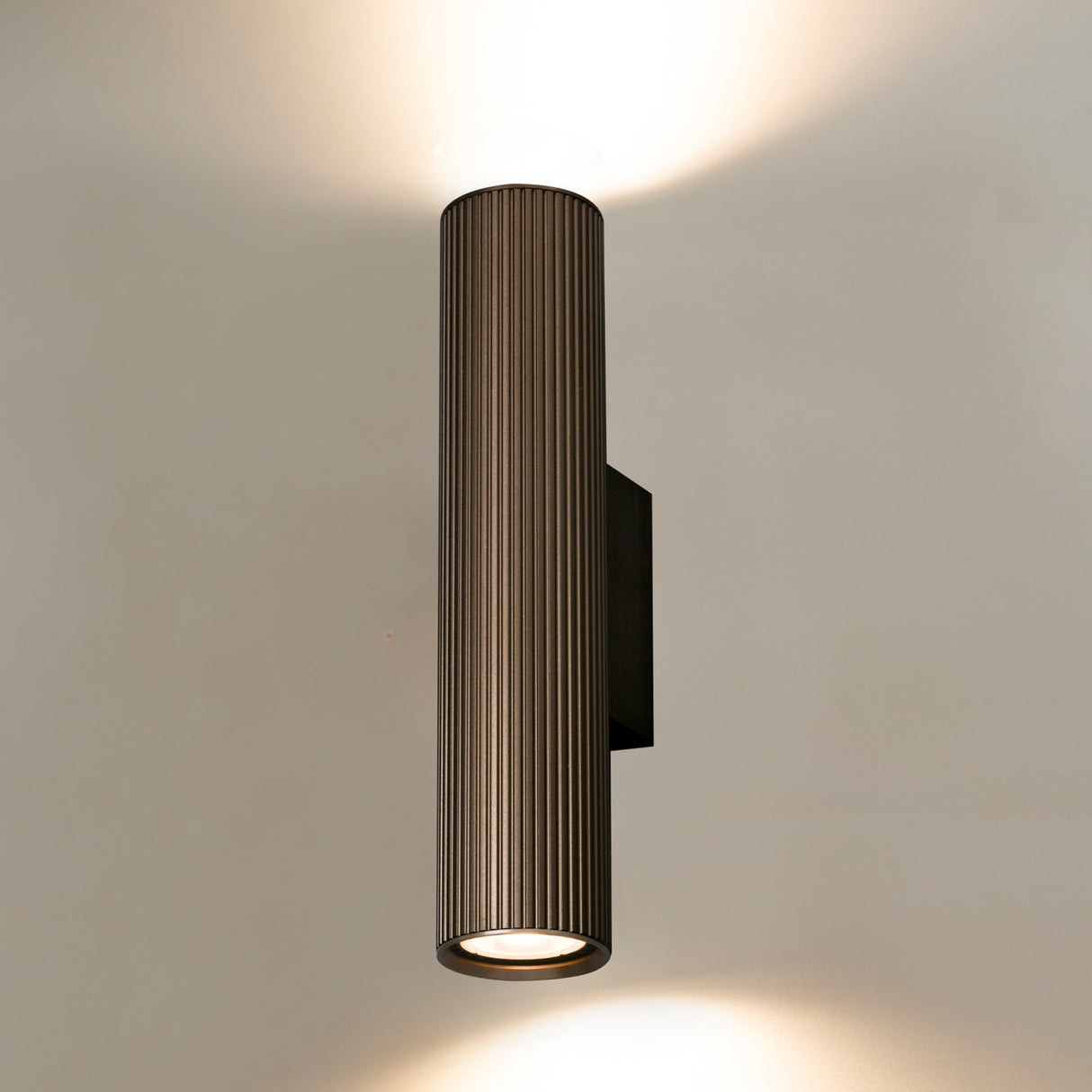 Scout 2 light wall light, shown on a dark background
