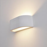 Fresco wall light, shown on a dark background