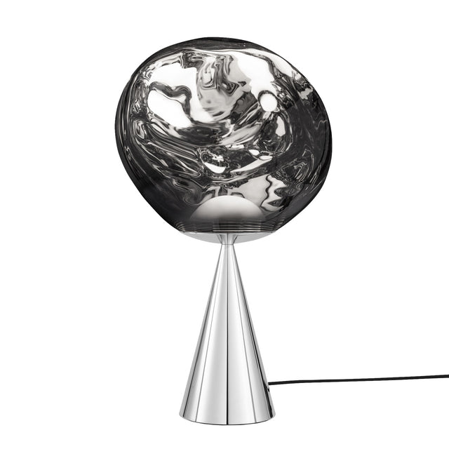 The Lava LED Table Lamp - Silver features a shiny, cone-shaped metallic base, a large reflective glass shade with abstract wavy texture, and a black power cord—perfect for adding modern style to contemporary interiors.