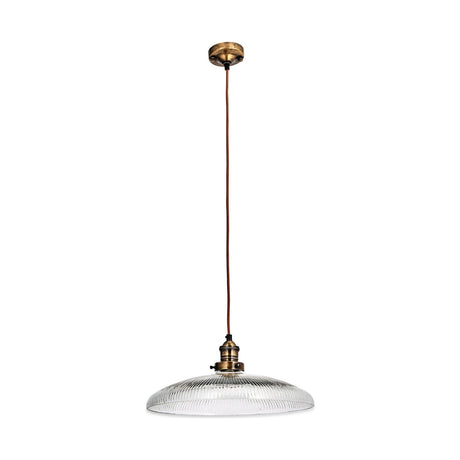 Zowie Large Glass Pendant Light in antique brass, with a wide ribbed glass dish shade, brass lampholder, and rust-coloured cord leading to a round brass ceiling rose on a plain white background.