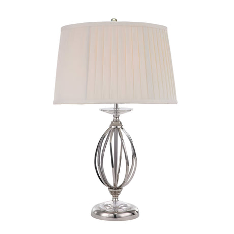 The Aegean Table Lamp - Polished Nickel features a silver, open spherical base made from polished nickel and is complemented by a white pleated fabric shade. Its hand-forged scroll base enhances its elegance, merging modern design with timeless sophistication.