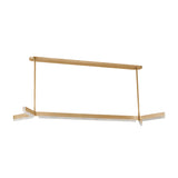 The Elvaris LED Alabaster Suspension Light in brushed brass features a geometric rectangular frame with angled bars and soft white accents, offering modern, clean lines and no visible bulbs for a sleek, minimalist look.