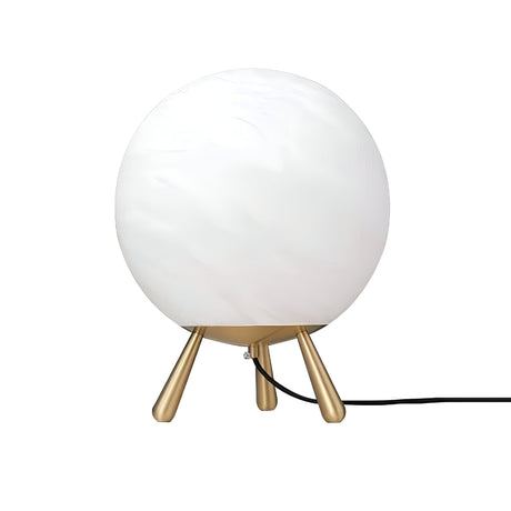 The Orlena Small Globe Alabaster Table Lamp in Brass & Soft White features a round white frosted glass shade resting on three angled brass legs, with a black power cord extending from the base.