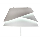 The Alboran 1 Light Floor Lamp in white & silver features a modern, asymmetrical lampshade with overlapping sections that let ambient light shine through—ideal for minimalist interiors. Shown against a plain white background.