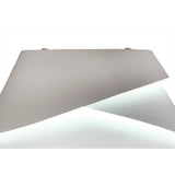 The Alboran 1 Light Floor Lamp in white and silver features a minimalist, modern design that emits soft white light—ideal for ambient lighting in sleek, contemporary interiors. Shown against a plain white background.