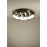 Alcadozo round LED flush ceiling light in bronze steel, 60cm wide, with wavy diagonal light strips on the back plate, mounted on a neutral ceiling.