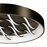 Close-up of the Alcadozo round LED flush ceiling light in bronze steel, showing wavy diagonal light strips set within a white inner ring against a plain white background.