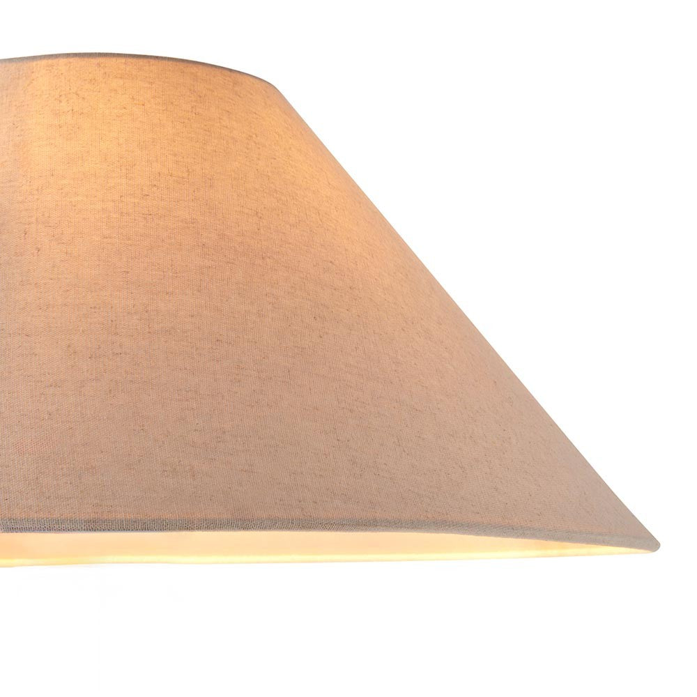 Endon Aldmere 52cm tapered lamp shade in natural faux linen, close-up of the wide sloping side showing woven fabric texture and warm inner glow.