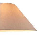 Endon Aldmere 52cm tapered lamp shade in natural faux linen, close-up of the wide sloping side showing woven fabric texture and warm inner glow.