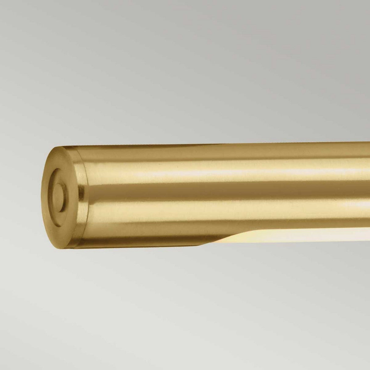 Close-up of the Alton 1 Light Large LED Picture Light in brushed brass against a neutral background. This modern wall sconce features a smooth, metallic finish with a circular end and emits art display lighting from its underside.