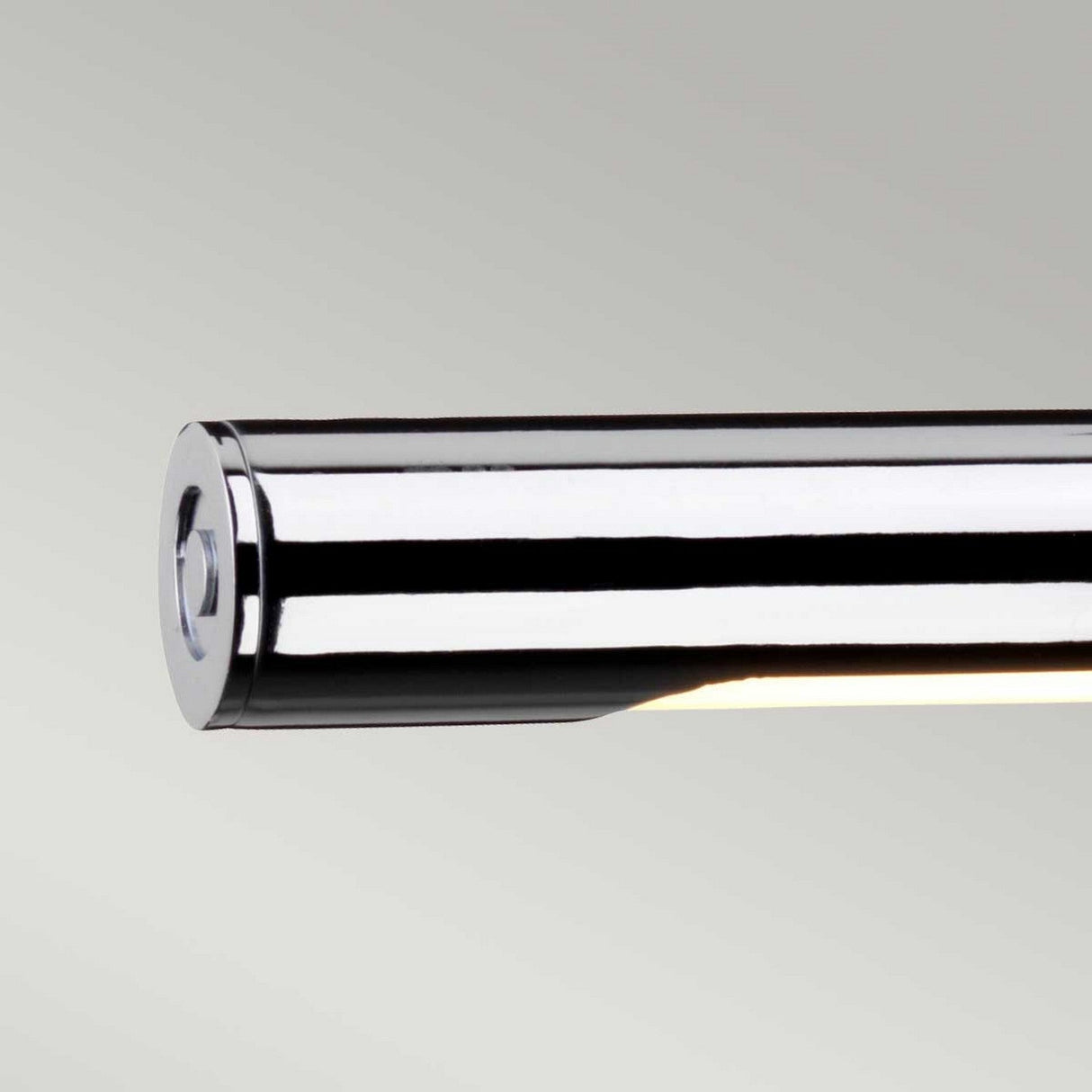 Close-up of the Alton 1 Light Large LED Picture Light in polished chrome displayed against a neutral background, showcasing a small illuminated section on the underside that makes it ideal for art illumination.