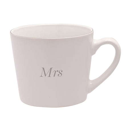 White tapered stoneware mug with matt finish and "Mrs" in grey italic serif lettering centred on the body, shown on a plain white background.