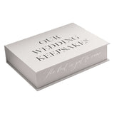 Rectangular grey wedding keepsake box with "Our Wedding Keepsakes" on the lid and "The best is yet to come" script on the front edge, shown closed on a white background.