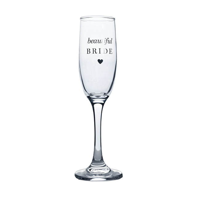 Clear glass champagne flute with tall slender bowl and long stem, printed "beautiful BRIDE" in silver script and capitals above a small heart, shown on a plain white background.