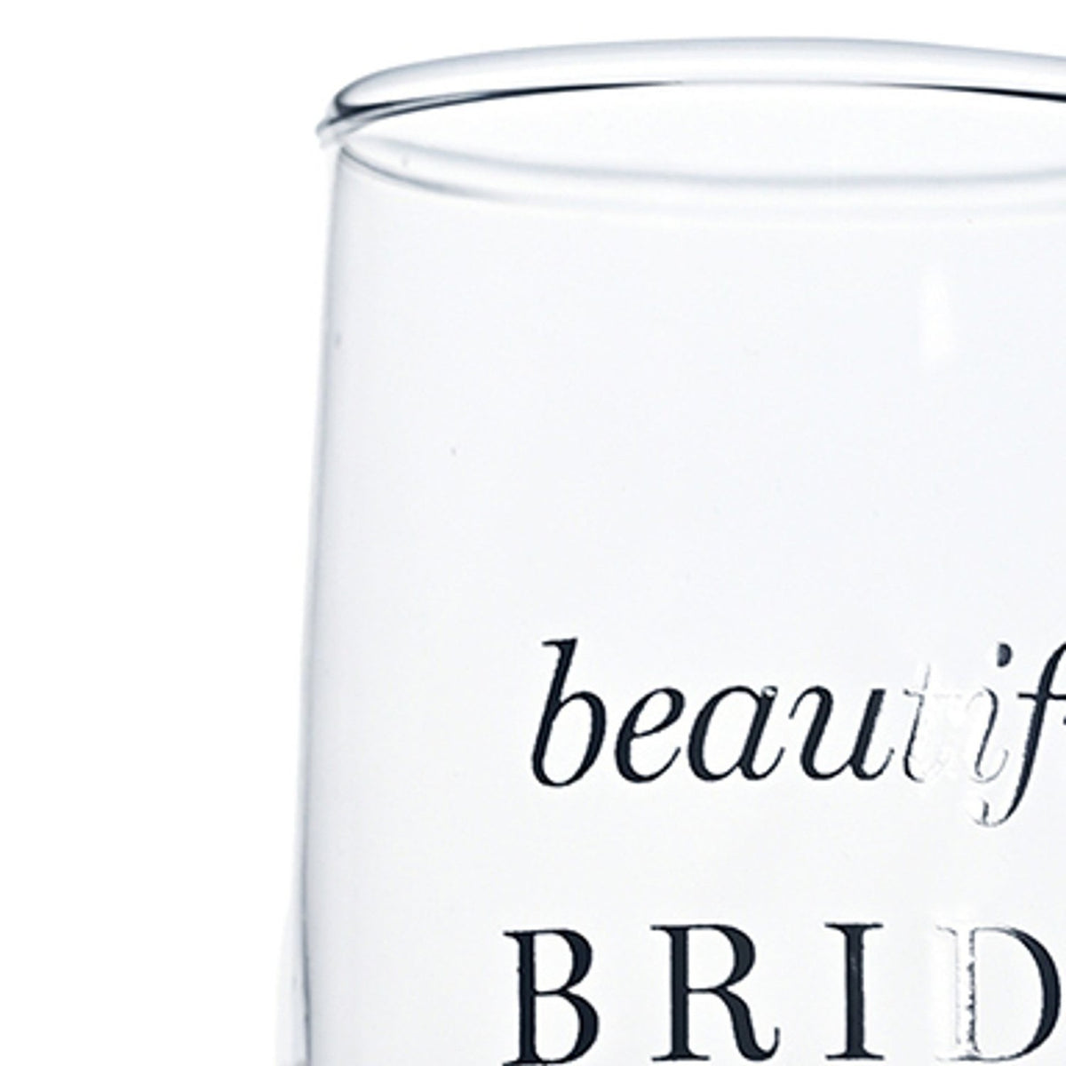 Close-up of a clear glass champagne flute showing "beautiful BRIDE" printed in silver script and capital lettering, set against a plain white background.