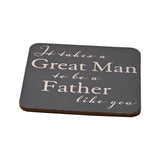 Rectangular grey coaster with rounded corners reading "It takes a Great Man to be a Father like you" in cream script and print, shown on a white background.