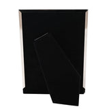 Rectangular photo frame in black with polished silver edging, shown from behind with easel stand extended, on a plain white background.