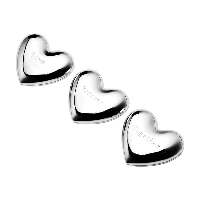 Three silverplated heart charm ornaments with a mirror-bright silver finish, engraved "Love", "Forever" and "Together", arranged diagonally on a white background.