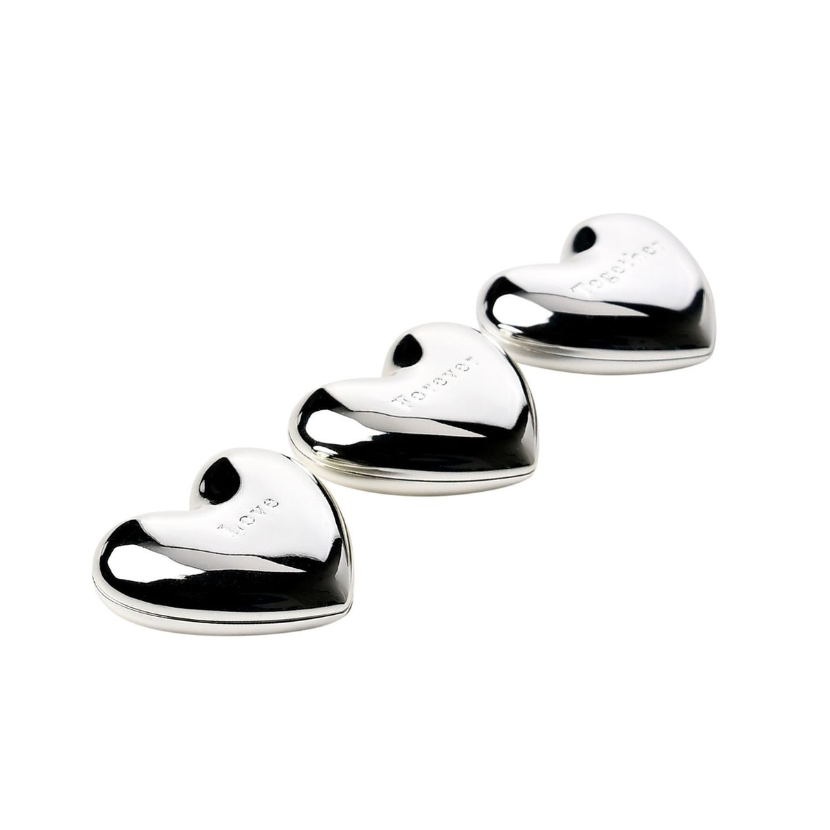 Three silverplated heart charm ornaments with a mirror-bright silver finish, each engraved with "Love", "Forever" and "Together", arranged in a row on a plain white background.