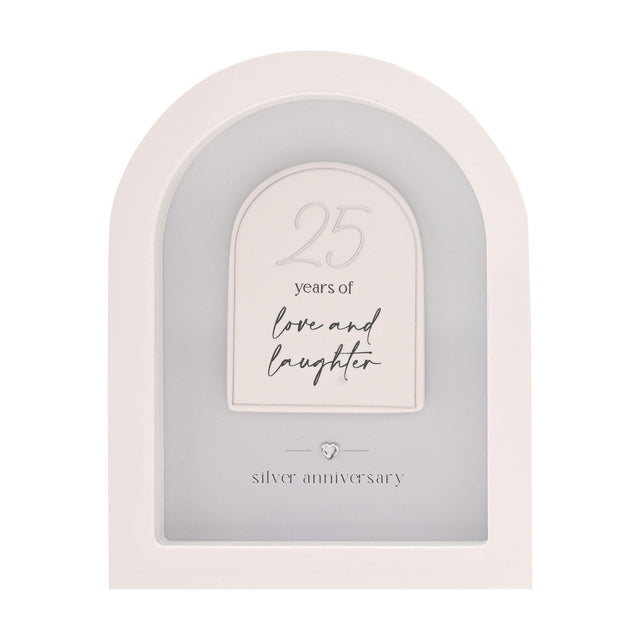 White MDF arched wall plaque with raised panel reading "25 years of love and laughter" and "silver anniversary" beneath a small heart, on a plain background.
